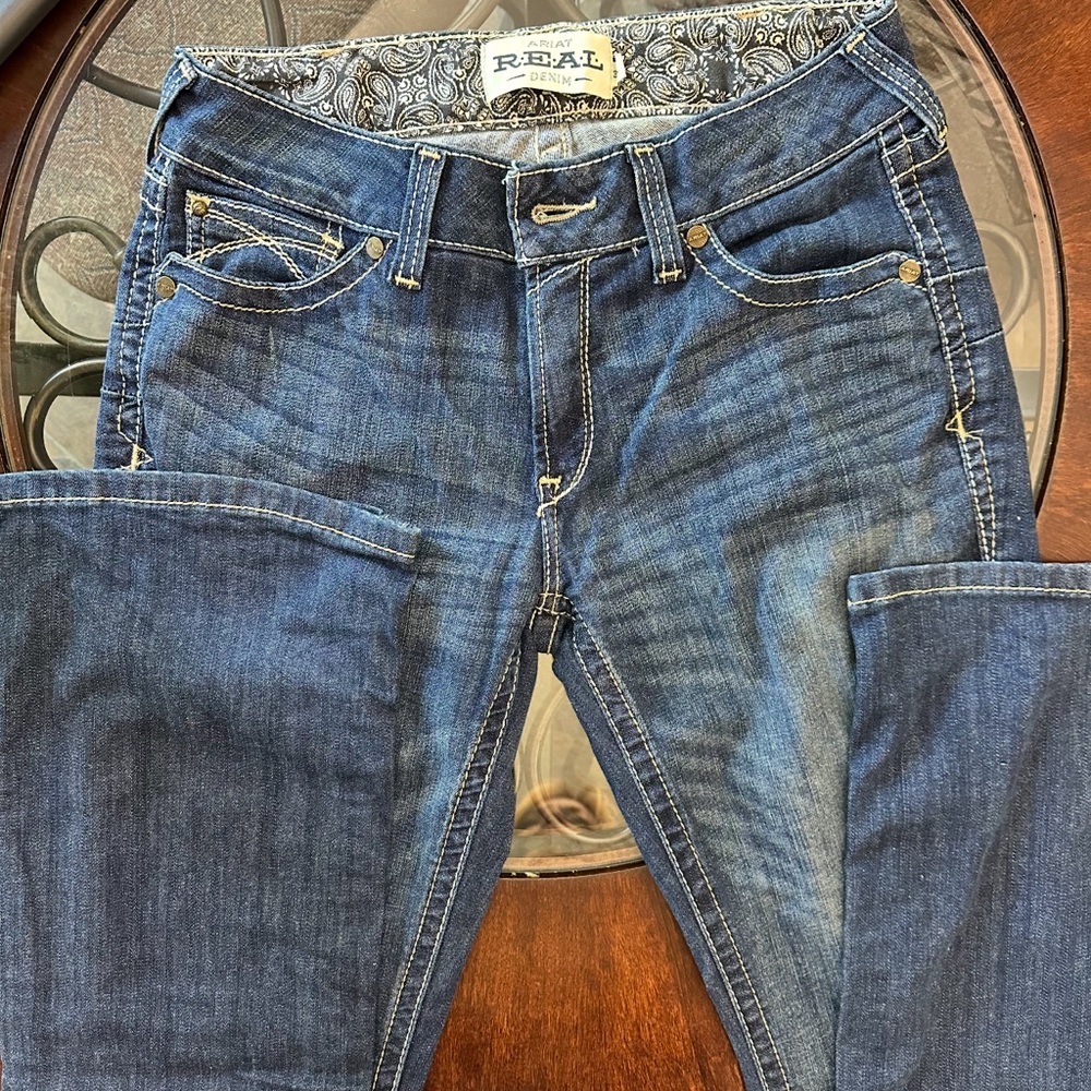 Blue Boot Cut Jeans with Natural Fading